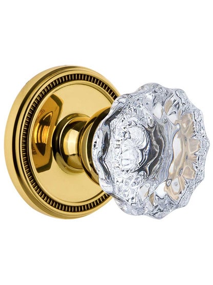 Grandeur Soleil Rosette Door Set with Fontainebleau Crystal-Glass Knobs in Polished Brass.
